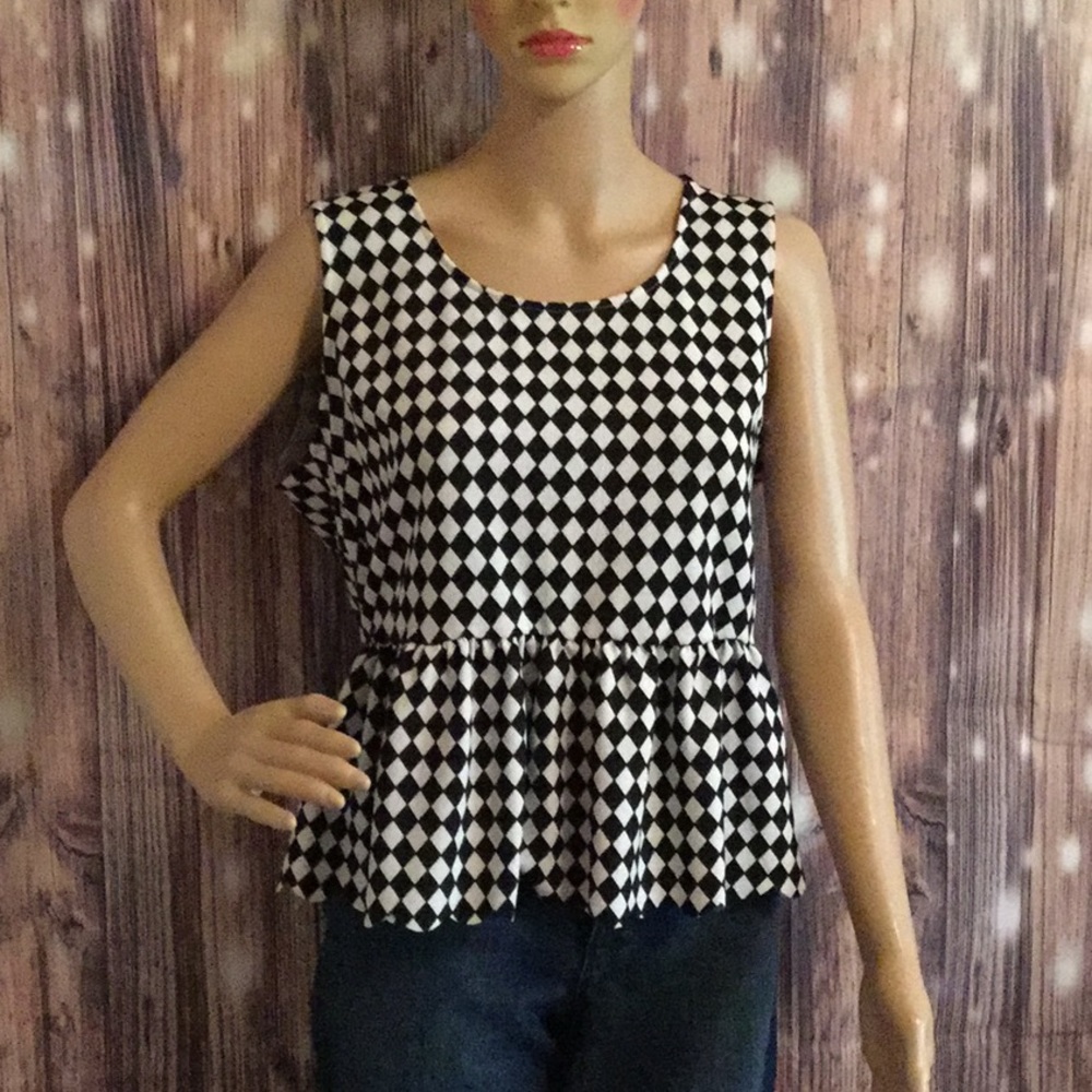 Charming Charlie black and white sleeveless blouse
